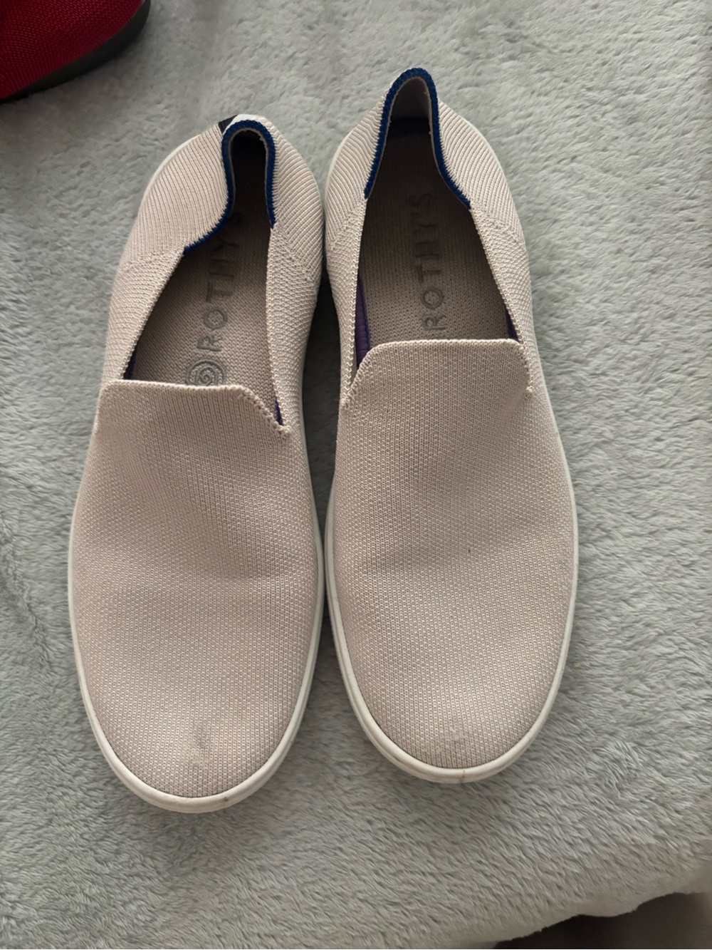 Rothy's Slip-On Athletic Sneakers in Light Beige with Blue Trim